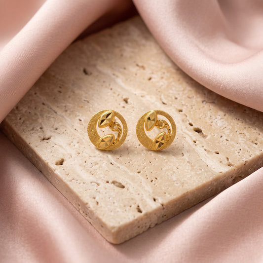 Yellow Gold Textured Circle Stud Earrings with Leaf Motif