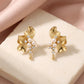 The Eternity Flower Diamond & Bahraini Pearl Dangling Earrings, product photo 1